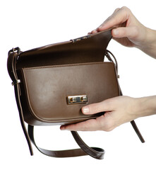 Hand holding brown leather bag beauty on white background isolation