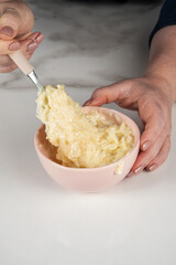 Coconut candy filling for milk chocolate Easter egg in a jar_vertical.