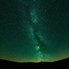 Fototapeta premium A stunning natural spectacle, often seen in remote areas with minimal light pollution, where countless stars create a breathtaking celestial display against the green night sky.