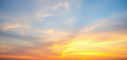 Obraz premium Soft blue twilight sky merging with warm sunset hues, peaceful heavenly scene, celestial, orange