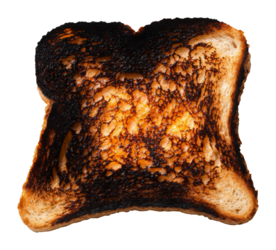 Burnt piece of toast with charred texture on edges, transparent background. Cooking mishap concept