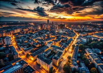 Obraz premium Dramatic Black and White Aerial Drone Shot of Cityscape at Dusk, Revealing Hidden Details