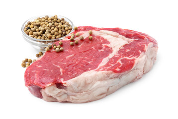 Piece of raw beef meat and spices isolated on white