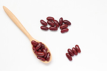 red beans in wooden spoon