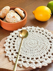 Lace doily tied with thread. Knitted napkin for home decoration. 