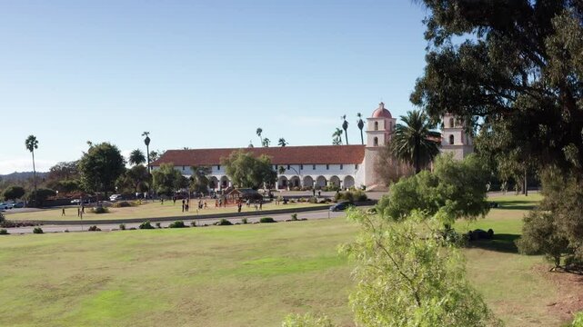 Low aerial dolly shot of the historic Mission Santa Barbara in Southern California. 4K