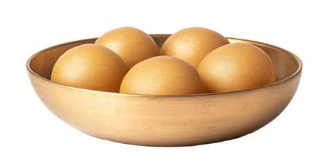 Five smooth, golden spheres rest in a golden bowl.