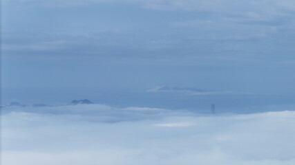 The Mountain Landscape Covered with Clouds Under