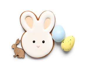 Tasty Easter cookie in shape of bunny, eggs and wooden rabbit isolated on white background