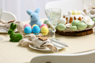 Table setting with Easter eggs, closeup