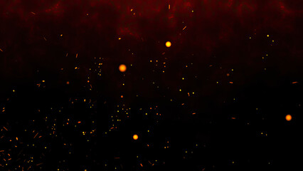 Fiery orange glowing flying ember particles on black background. Burning red hot sparks rise from light fire  background of bonfire.