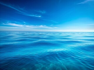 Obraz premium Minimalist Blue Ocean Wave Background: Serene Coastal Seascape
