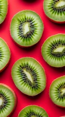 Fototapeta premium close-up of kiwi slices on a isolated red background