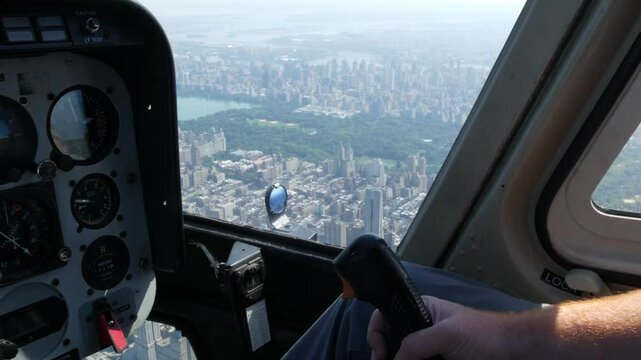 New York City helicopter cabin flight, heli cockpit flying over Manhattan, United States. Extreme tourism, travel USA. Camera shaking.