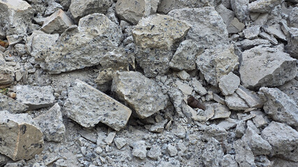 Pile of broken concrete rubble and debris