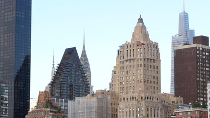 New York City skyline, Manhattan Midtown Empire State building, iconic skyscrapers cityscape. Chrysler building, Vanderbilt tower. United States architecture. Real Estate. View from Roosevelt Island.