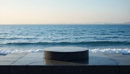 Round Marble Platform on a Stone Terrace with a Coastal Beach Background