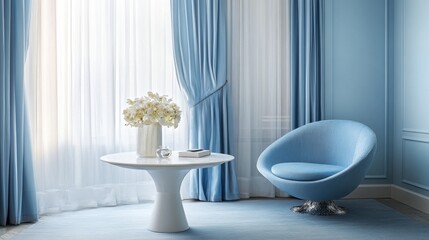 82.A calming palette of light blue walls, a sophisticated blue chair, a round white table adorned with a simple centerpiece, and sheer, massive curtains on the left side, adding to the inviting
