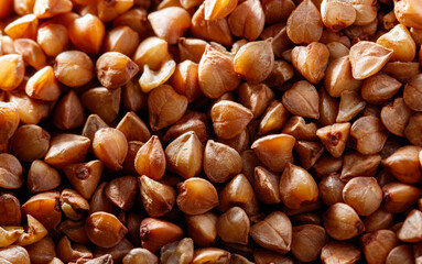 A close up of a pile of brown grains