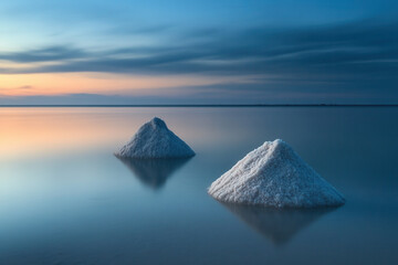Serene sunset reflection over salt pyramids tranquil lake landscape photography natural environment peaceful viewpoint