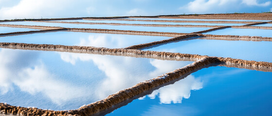 Reflective salt flats amidst clear skies nature landscape photography scenic vista tranquil environment