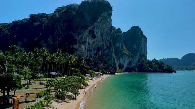 Vibrant turquoise waters gently lapping against golden sands invite visitors to relax on Thailands stunning beaches. Tonsai Beach Krabi
