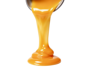 honey dripping from spoon