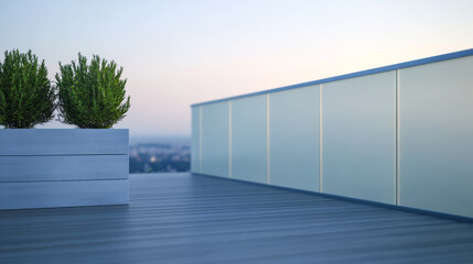 Obraz premium Rooftop garden with greenery and modern railing at sunset time in an urban setting
