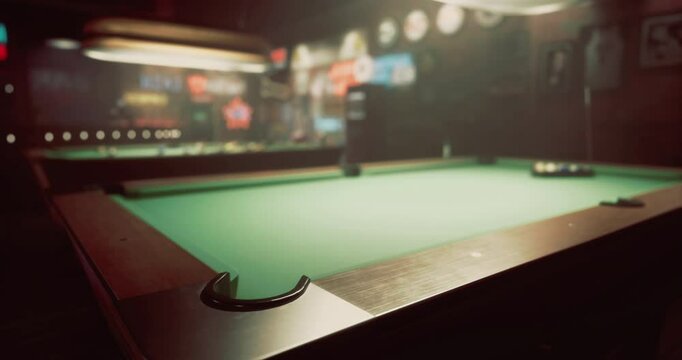 A green felt pool table is set up for a game in a cozy bar adorned with vintage signs and ambient lighting. The atmosphere is inviting for friends to gather and play.