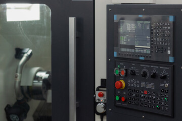Innovative Precision Machining Equipment Operating in a Modern Manufacturing Facility During the...
