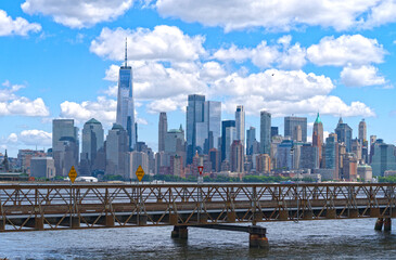 Naklejka premium New York City. NYC cityscape with skyscrapers. Panoramic of New York City skyline. Manhattan skyline. New York and Hudson River. Downtown NYC. New York skyscrapers. The business district of NYC.