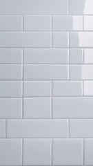 White subway tile wall with glossy ceramic surface. Modern interior background for kitchen, bathroom, and architectural design