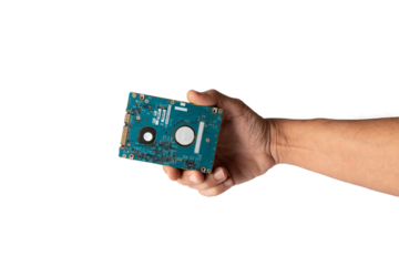 Male hand holding a hard drive HDD device isolated no background