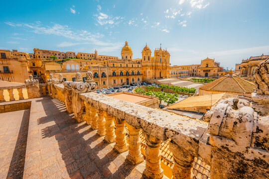 view in Noto, with the Basilica Minore di San Nicolo and Palazzo Ducezio, Sicily, Italy. Chiesa di San Carlo al Corso.