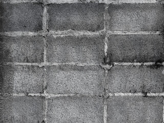 Large brick wall, old gray cement block wall texture background.