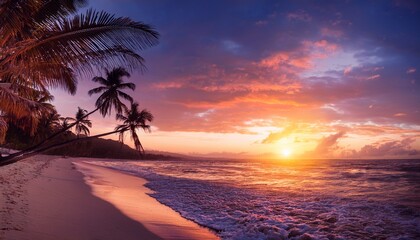 colorful sunset over a tropical beach with palm trees