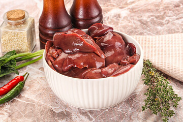 Raw uncokked chicken liver in the bowl