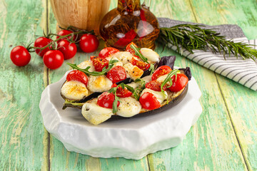 Baked eggplant with cherry and mozzarella