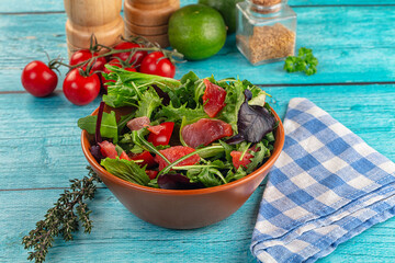 Salad with salmon and arugula