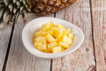 Sweet canned pineapple fruit pieces