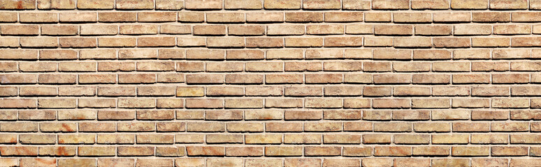 Full horizontal texture of old brick wall. Background texture of retro brick wall. Horizontal pattern for banner or skinali. Backdrop with vintage brick wall pattern