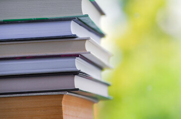 A simple composition of many hardback books. Going back to school. Education.