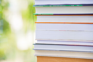 A simple composition of many hardback books. Going back to school. Education.