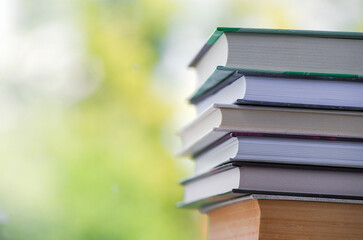 A simple composition of many hardback books. Going back to school. Education.