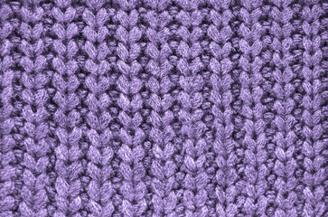 Fototapeta premium Pink knitted fabric background texture