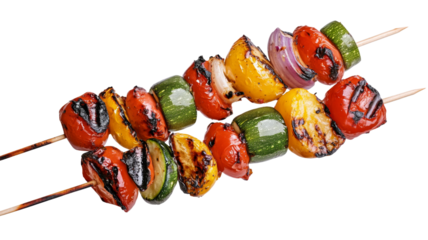 Grilled vegetable skewers with zucchini, tomatoes, bell peppers, and onions on transparent background