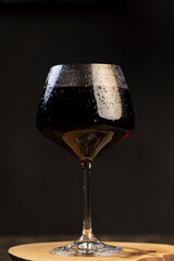red drink in a glass glass