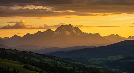 Fototapeta premium Stunning sunset over a mountain landscape
