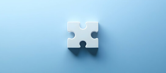 Photo of a white puzzle piece on a blue background.