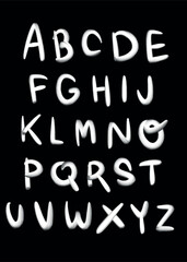 Alphabet letters in white on a black background